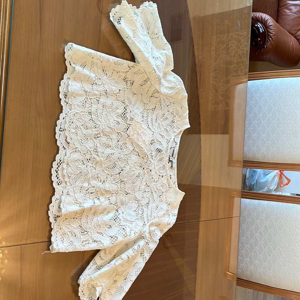 Stunning Alexis brand crop top. Lace floral print.